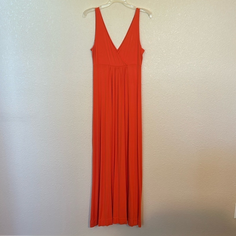 Women’s New York and Co orange maxi dress size XS.